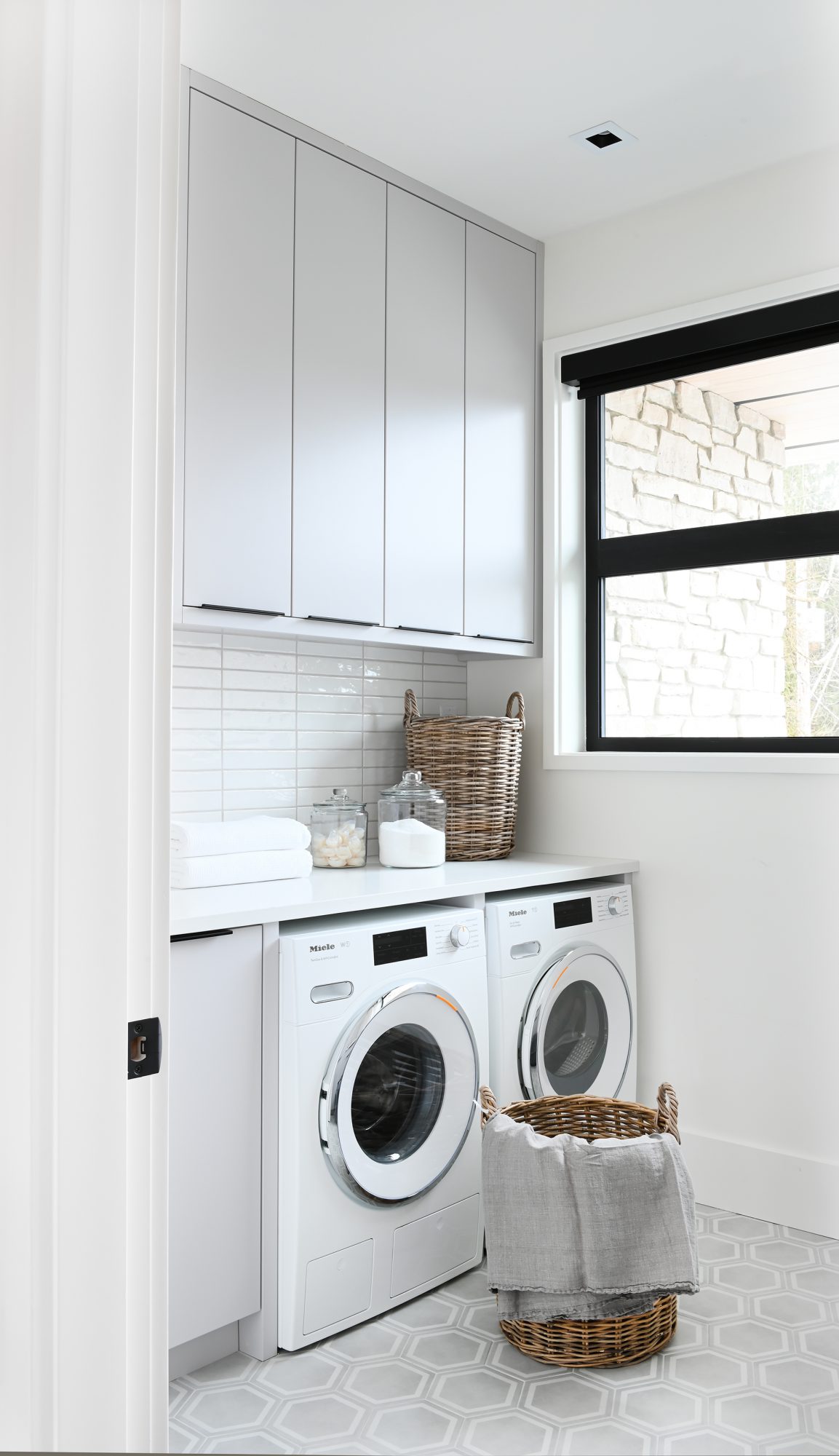 Ferme Moderne laundry room built by Midland Premium Properties in Vancouver, BC